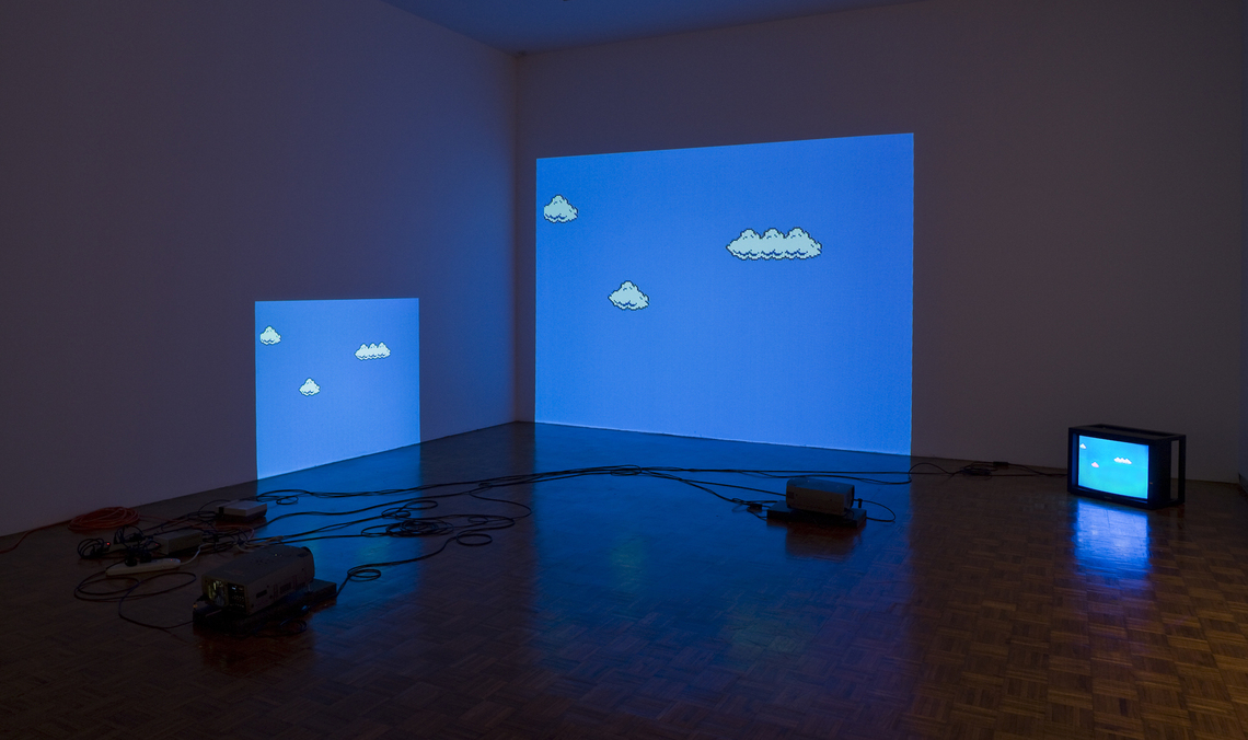Cory Arcangel, Super Mario Clouds, 2002 (installation view at the Whitney Museum of American Art). Handmade hacked Super Mario Brothers cartridge and Nintendo NES video game system, edition 2/5