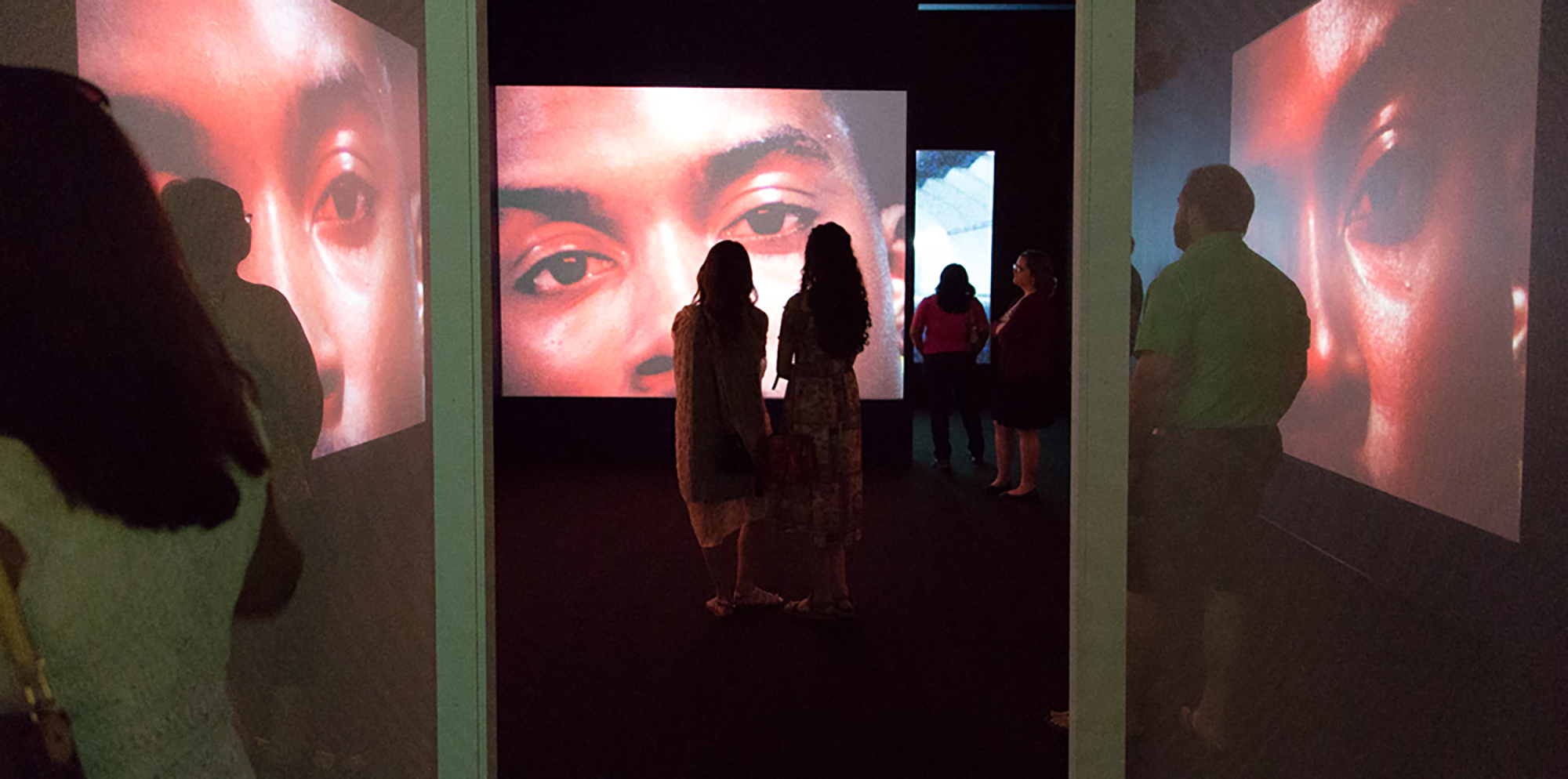Doug Aitken exhibition with visitors