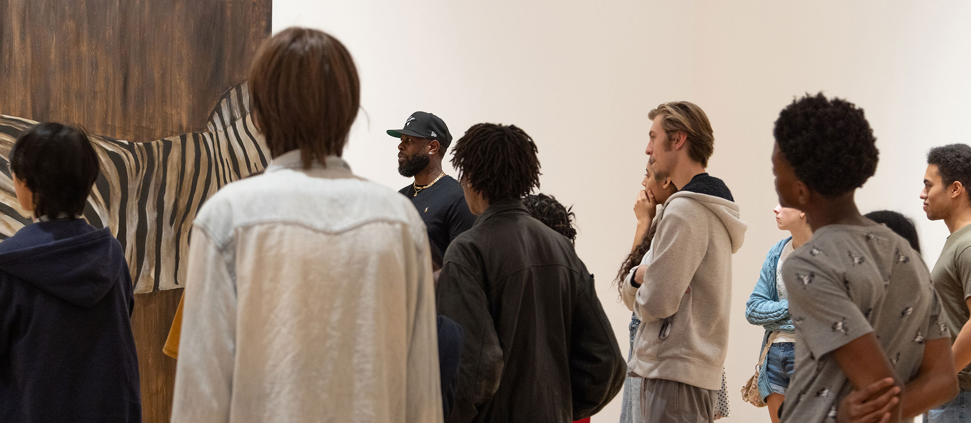 TAP students in gallery with artist