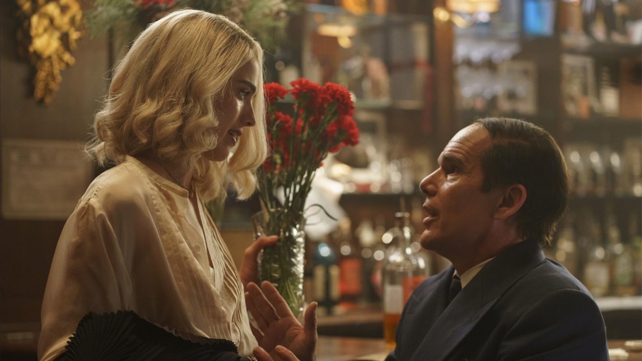 Man and woman sitting at a bar