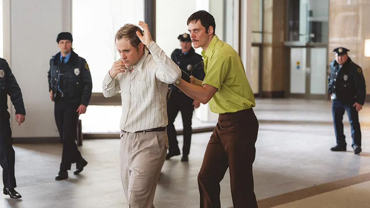 Man being taken under custody