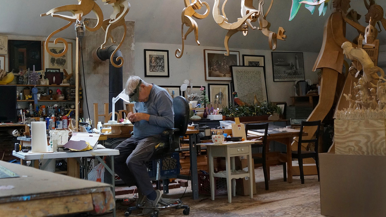 Old man in art studio