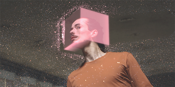 White man with pink cube around head. Photo credit Anchor Points