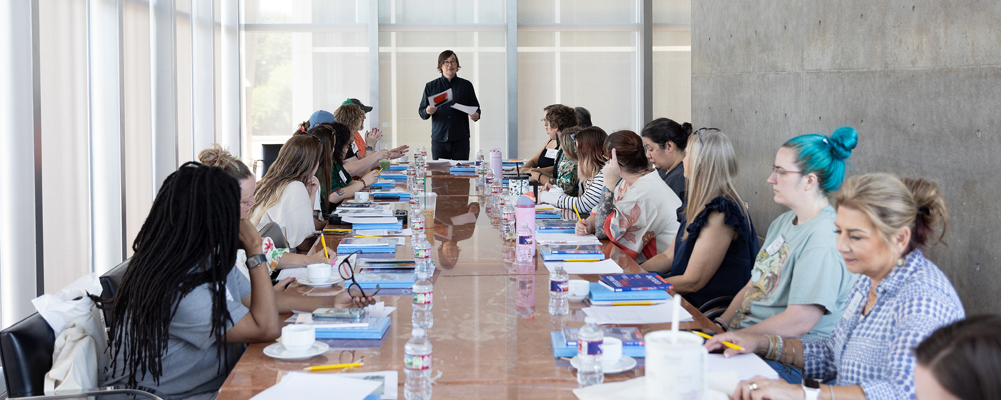 Instructor leading student teachers at table
