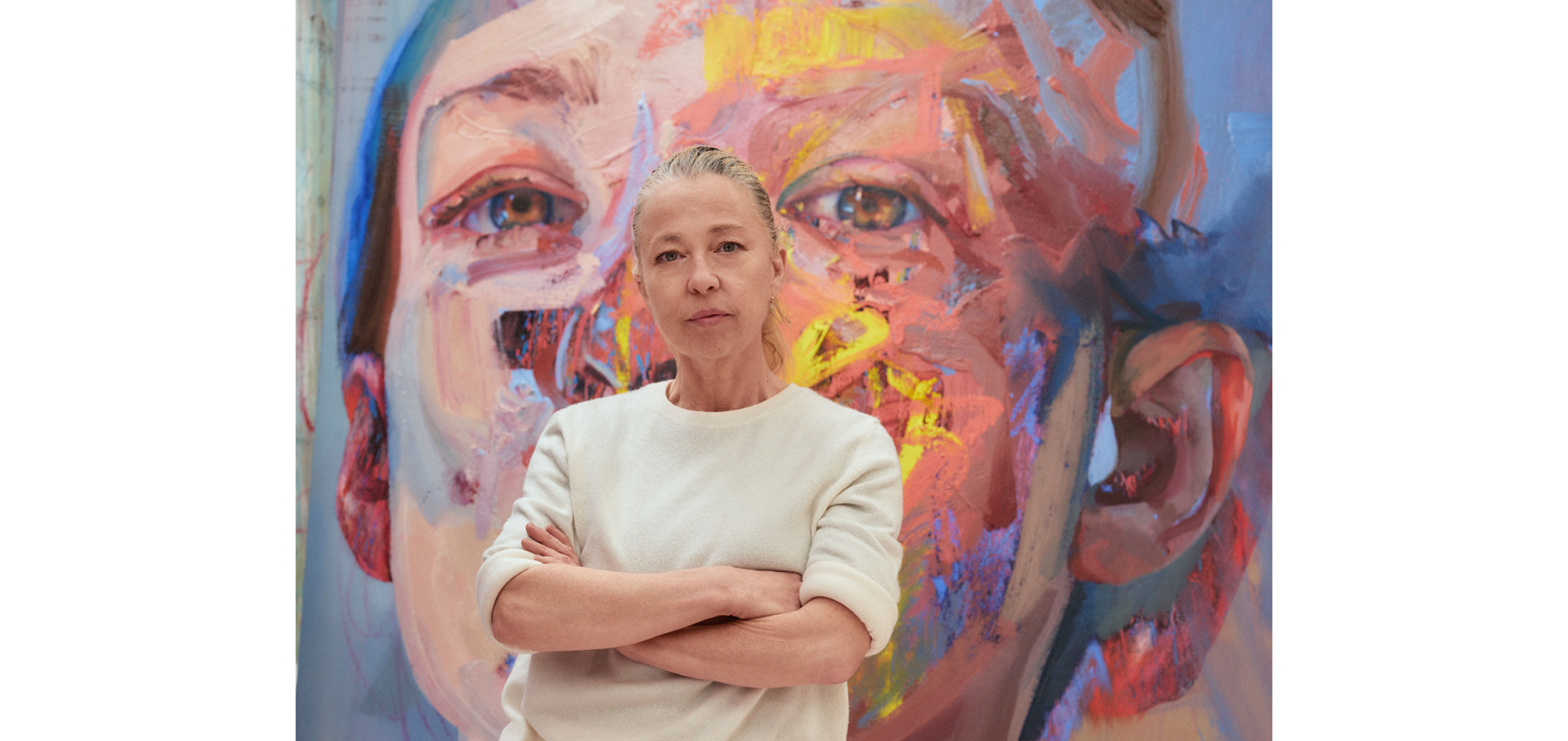 Portrait of Jenny Saville in front of her painting